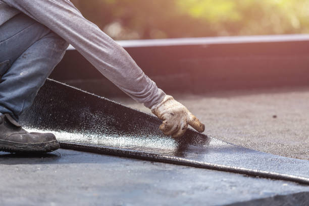 Professional Basement Waterproofing technician working in Reynolds, IN